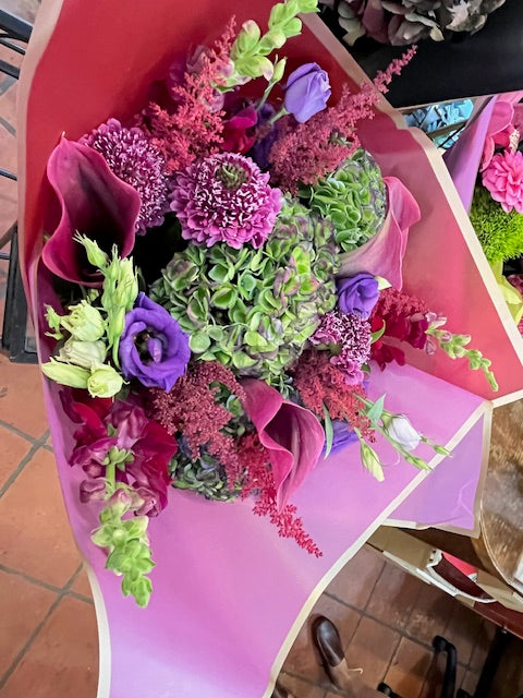 Green Envy from above: green hydrangea, plum calla lilies, purple lisianthus, scabiosa, astilbe and green snapdragons