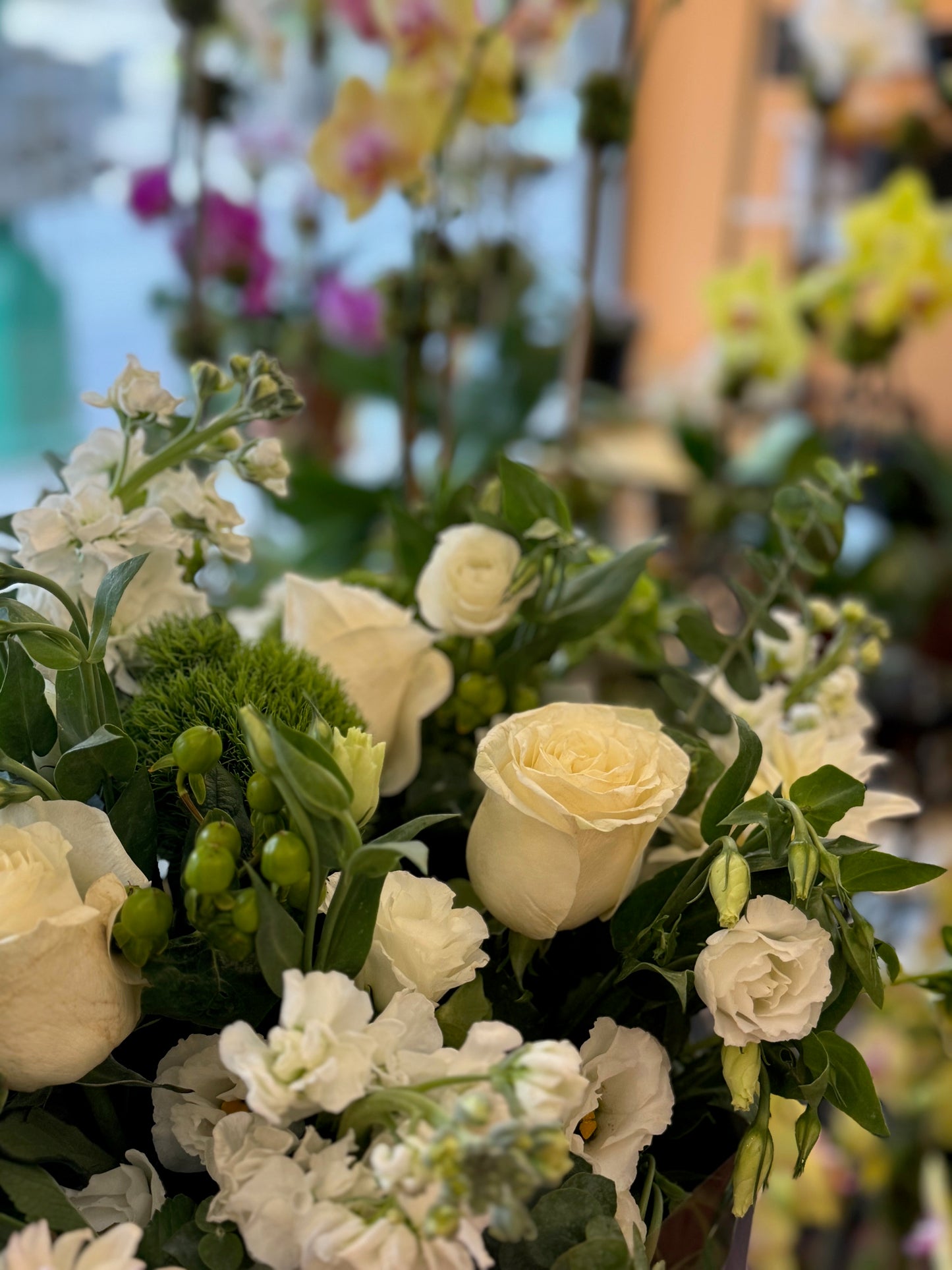 Erly Afternoon, large without vase: cream roses, white lisianthus, stock, green dianthus and hypericum berries