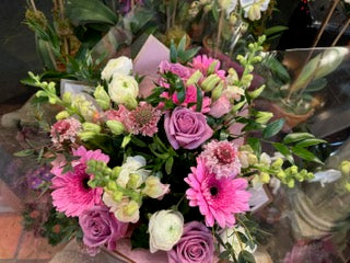 
                    
                      Good Vibes, No Vase option: wrapped bouquet of pink gerberas, lavender roses, white ranunculus and snapdragons
                    
                  