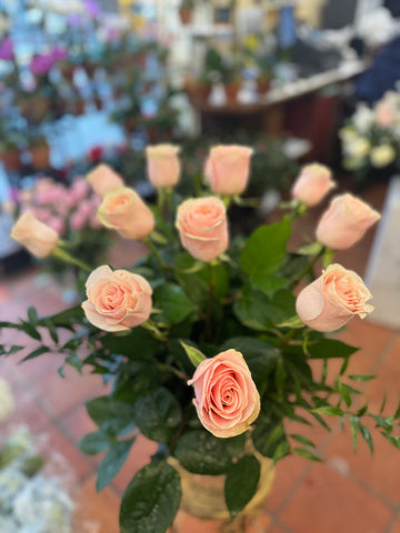 
                    
                      Pink Roses, large size, peach-pink roses and greenery seen from above
                    
                  